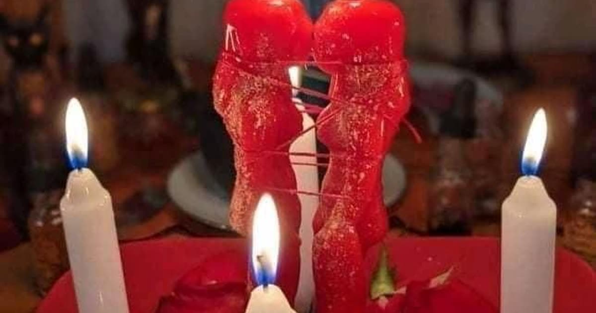 Red figure candles on Paola Lopez’s spiritual altar
